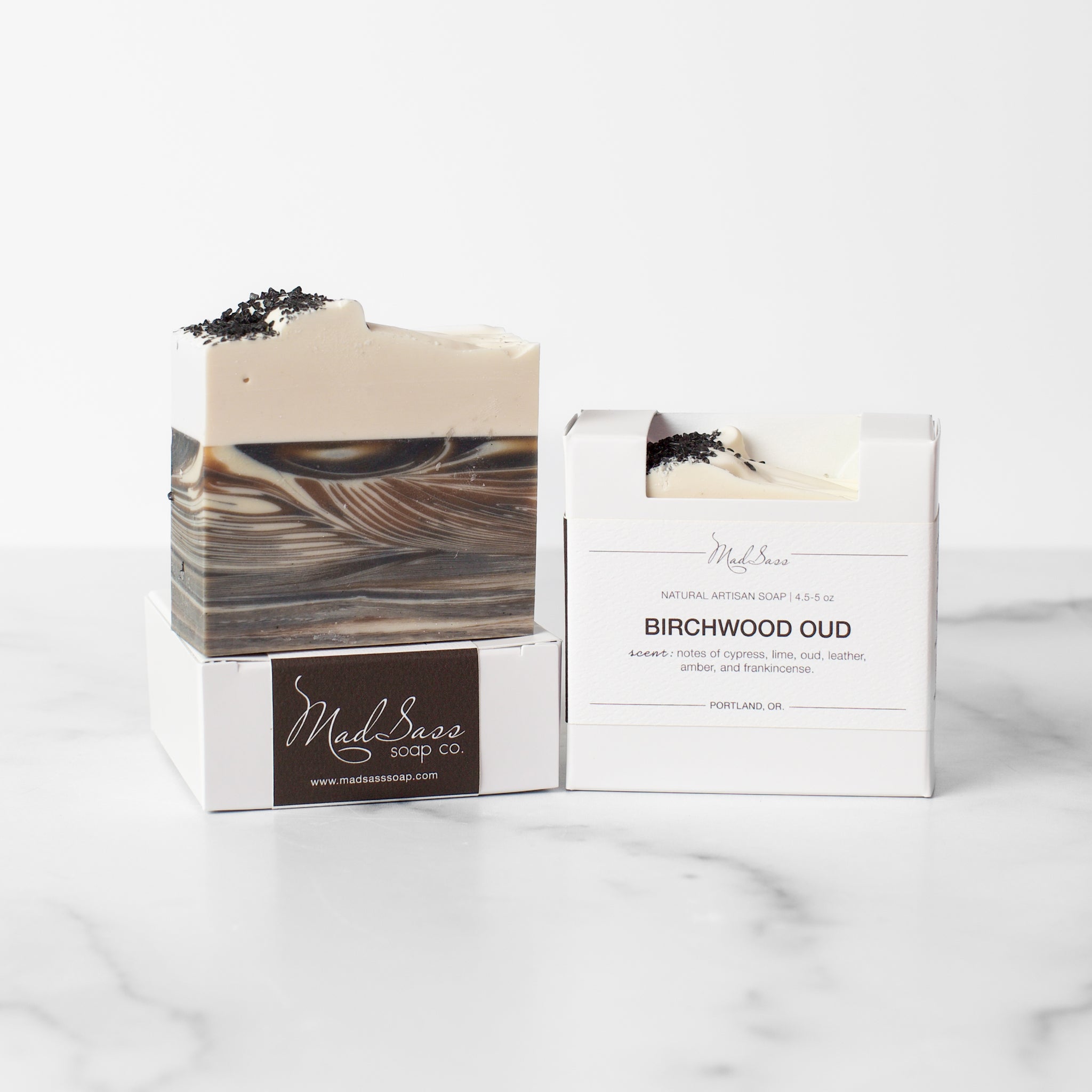 Luxury Artisan Handcrafted Soap from Mad Sass Soap Co, featuring Birchwood Oud with a rich, swirled design and a blend of natural ingredients, perfect for sensitive skin.