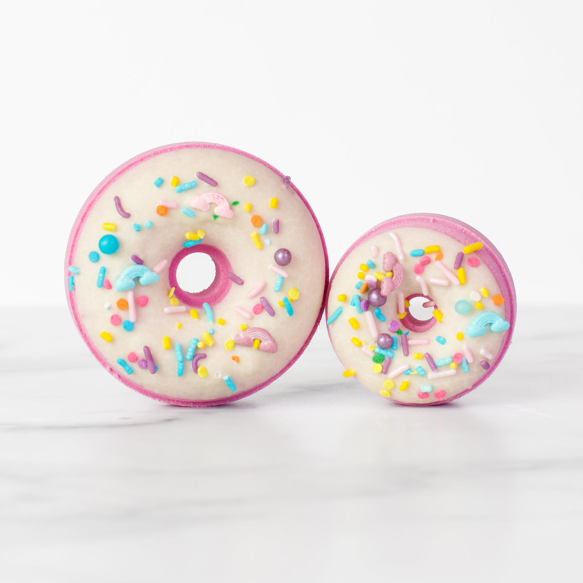 Happy Hour bath bomb by Mad Sass Soap Co - a luxurious and hydrating donut-shaped bath bomb with colorful sprinkles, perfect for a spa experience.
