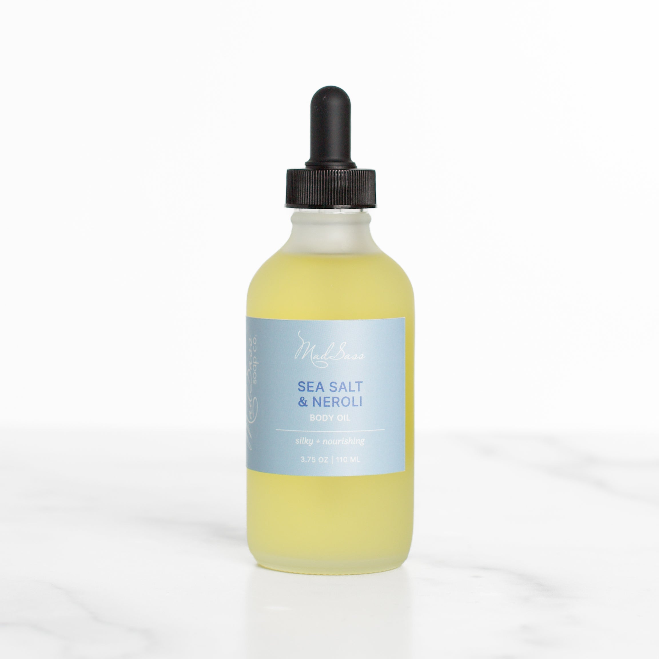 Elegantly presented Sea Salt & Neroli - Body Oil by Mad Sass Soap Co, showcasing the luxurious skin nourishing body oil in a sleek dropper bottle design, perfect for softening and revitalizing skin.