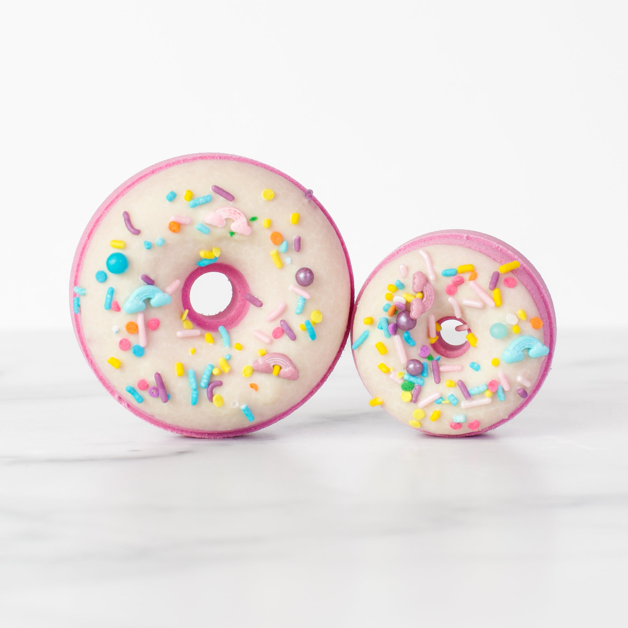 Happy Hour bath bomb by Mad Sass Soap Co - a luxurious and hydrating donut-shaped bath bomb with colorful sprinkles, perfect for a spa experience.