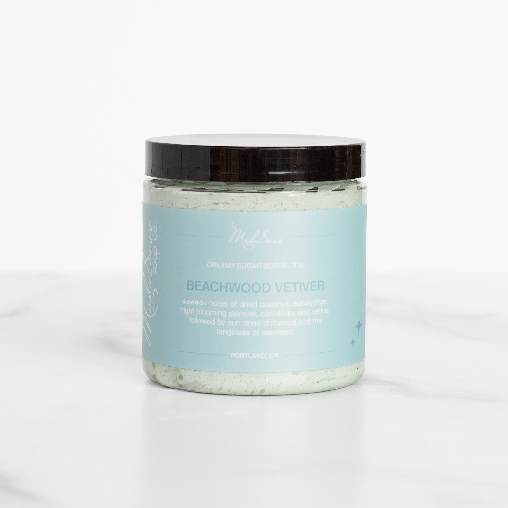 Beachwood Vetiver hydrating luxury sugar scrub by Mad Sass Soap Co in an elegant jar, showcasing its creamy, exfoliating texture and luxurious packaging.